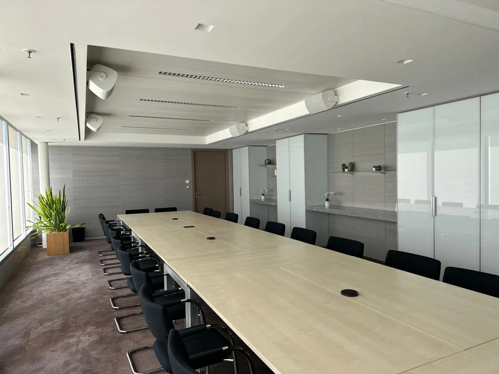 Spacious conference room with floor-to-ceiling windows