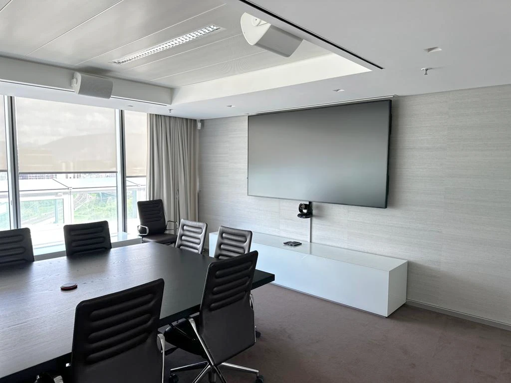 Premium conference room with textured walls and modern furnishings