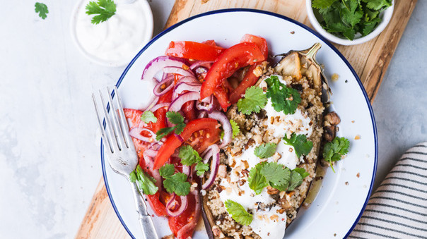 Healthy grain bowl with vegetables and herbs
